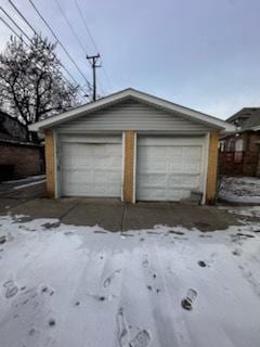 view of snow covered garage