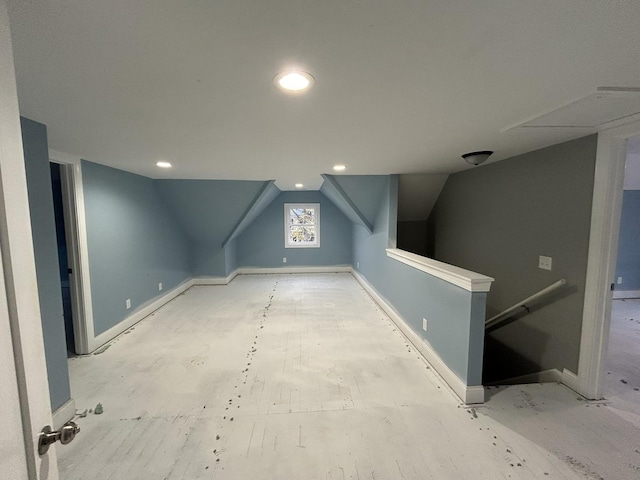 bonus room featuring lofted ceiling