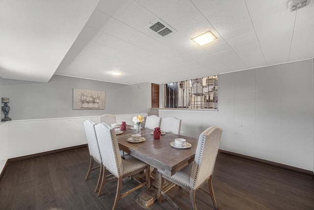 dining room featuring dark wood-type flooring