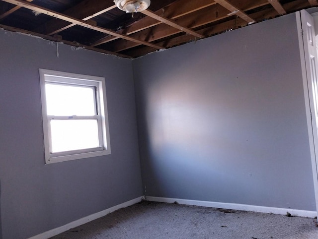 empty room featuring carpet floors