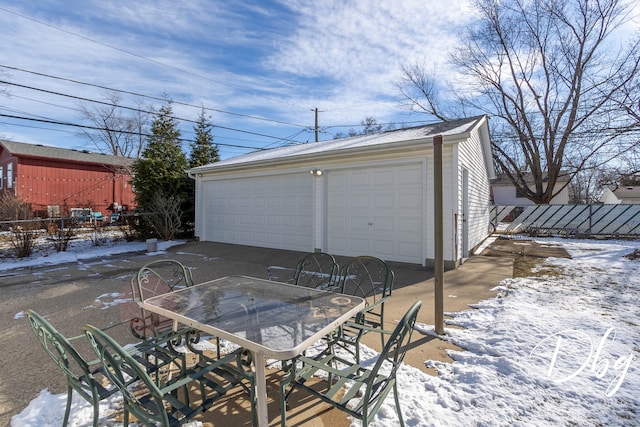 view of snow covered garage