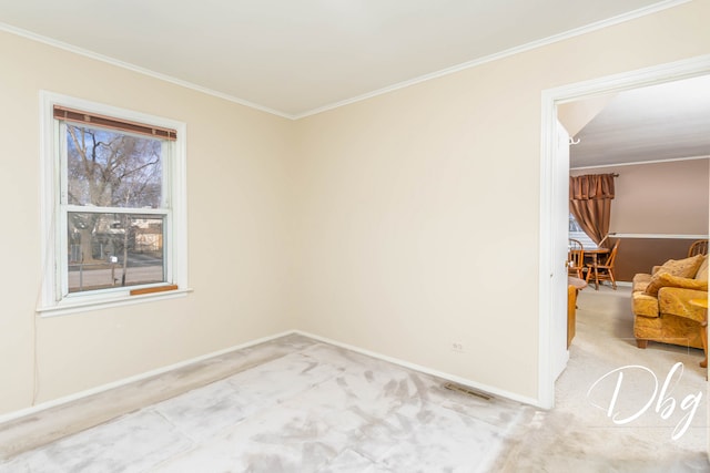 unfurnished room featuring crown molding and light carpet