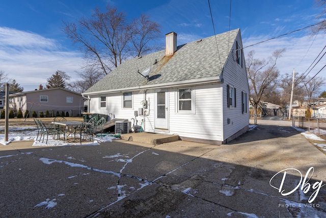 back of house featuring central AC and a patio