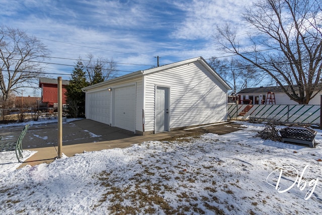 view of snow covered garage