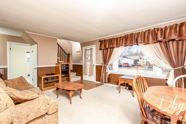 carpeted living room with plenty of natural light