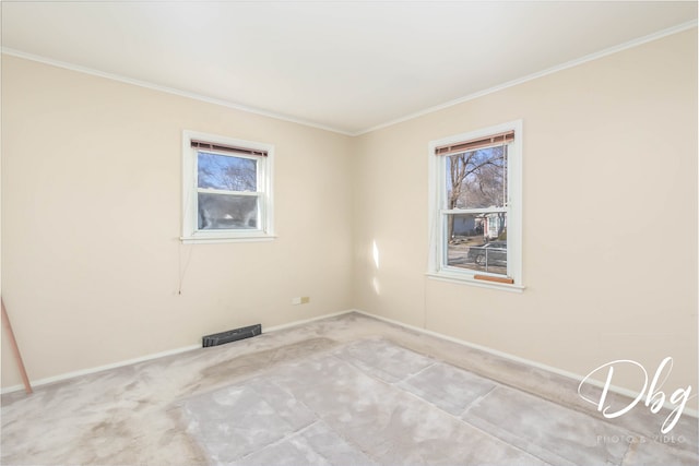 spare room featuring ornamental molding