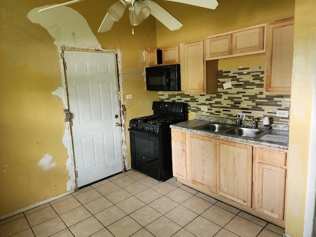 kitchen featuring light brown cabinetry, sink, decorative backsplash, light tile patterned floors, and black appliances