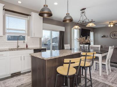 26011 S Old Farm Ct, Channahon, IL 60410 - kitchen featuring a sink, a center island, light stone counters, light wood finished floors, and recessed lighting