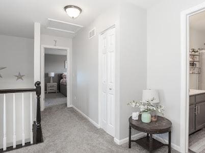 26011 S Old Farm Ct, Channahon, IL 60410 - hallway with attic access, light colored carpet, and baseboards