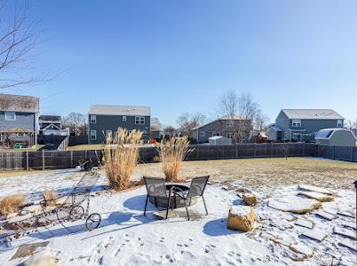 26011 S Old Farm Ct, Channahon, IL 60410 - yard covered in snow featuring fence and a residential view