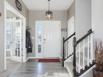 26011 S Old Farm Ct, Channahon, IL 60410 - entrance foyer featuring wood finished floors, stairs, french doors, and baseboards