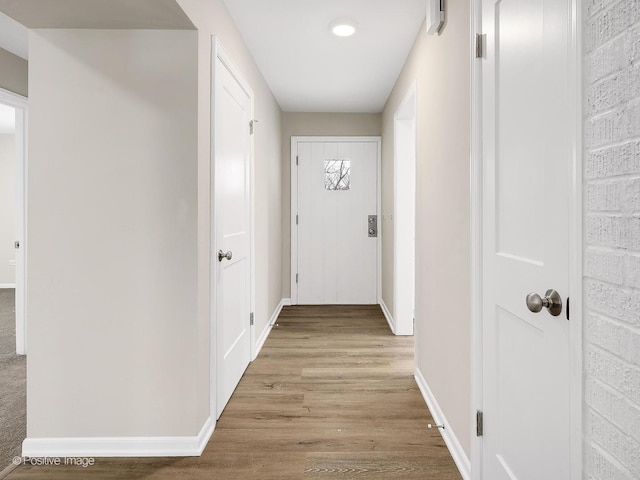 corridor featuring light hardwood / wood-style flooring