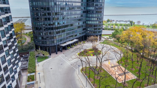 birds eye view of property featuring a water view