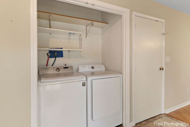 laundry room featuring independent washer and dryer