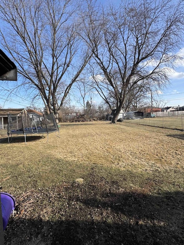 view of yard with a trampoline