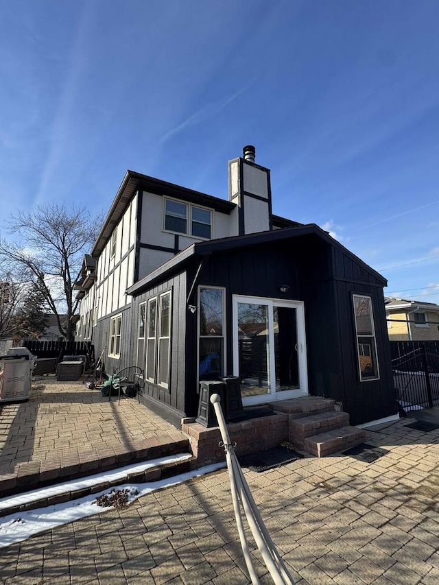 back of house featuring a patio