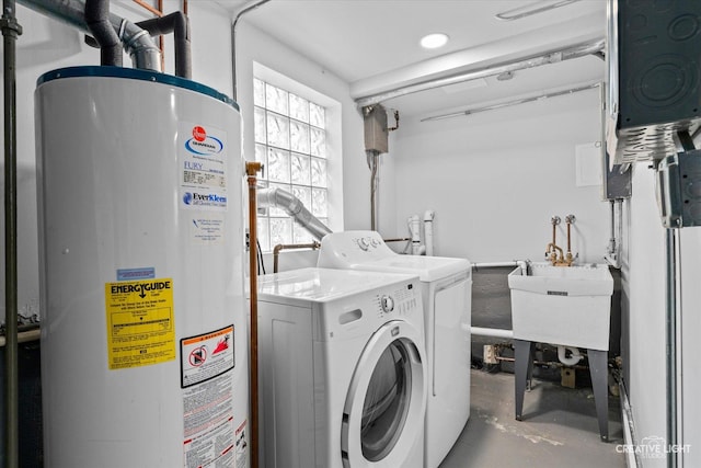 laundry area featuring washer and clothes dryer and gas water heater