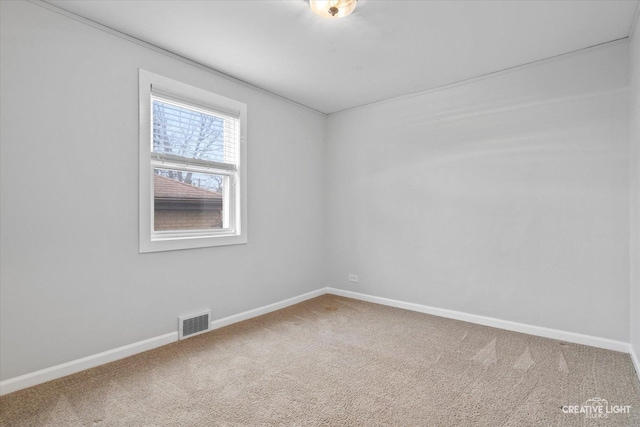 view of carpeted spare room