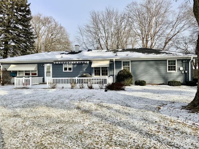 view of snow covered property