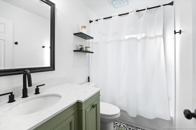 full bathroom with shower / bathtub combination with curtain, vanity, and toilet