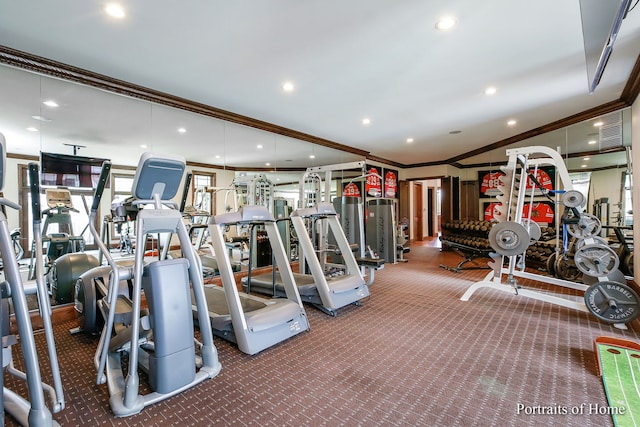 gym with crown molding and carpet flooring