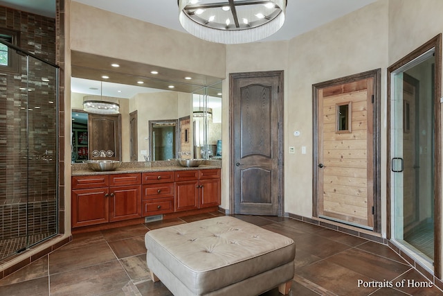 bathroom with vanity and walk in shower