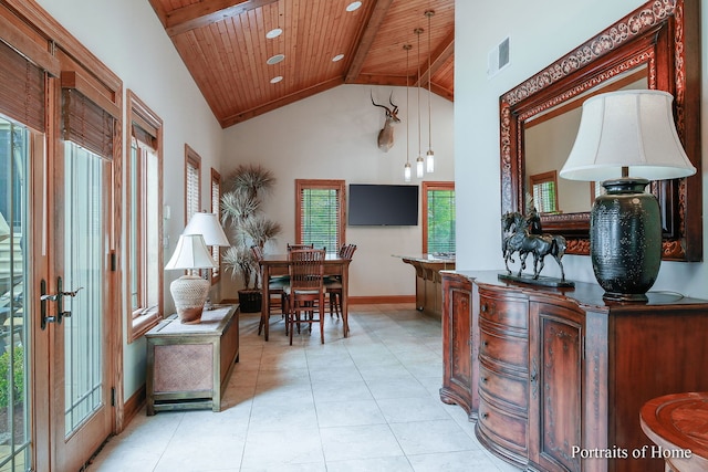 interior space with wood ceiling and high vaulted ceiling