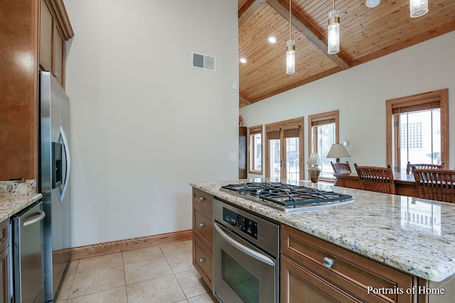 kitchen with appliances with stainless steel finishes, pendant lighting, light stone counters, wood ceiling, and beam ceiling