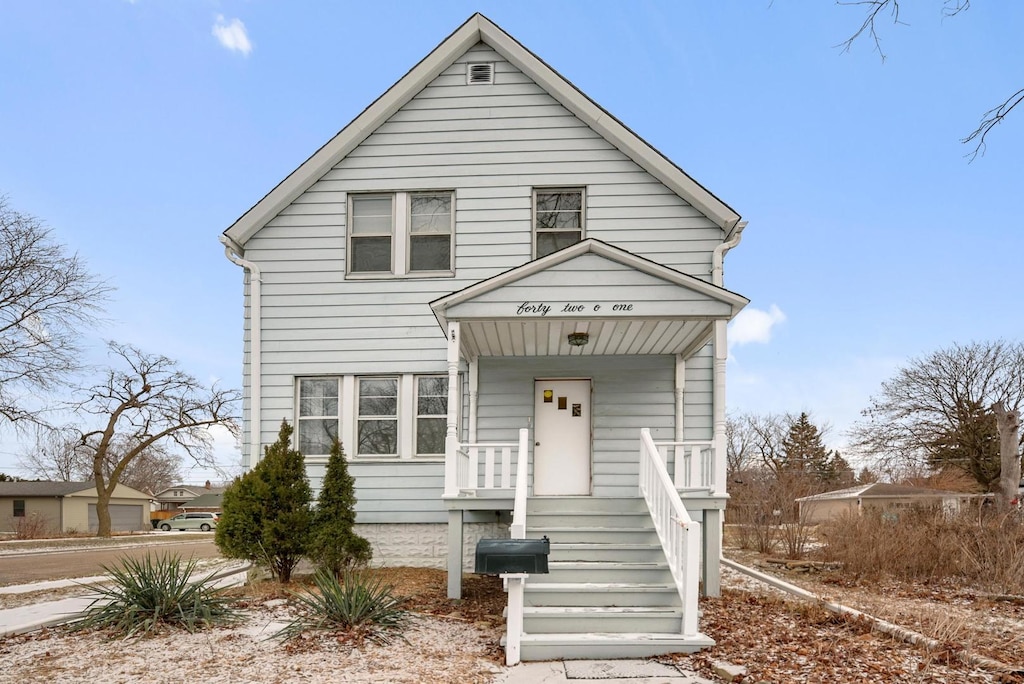 view of front of home featuring covered porch