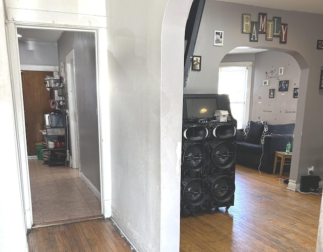 hallway featuring wood-type flooring