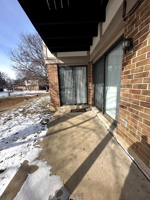 view of snow covered patio