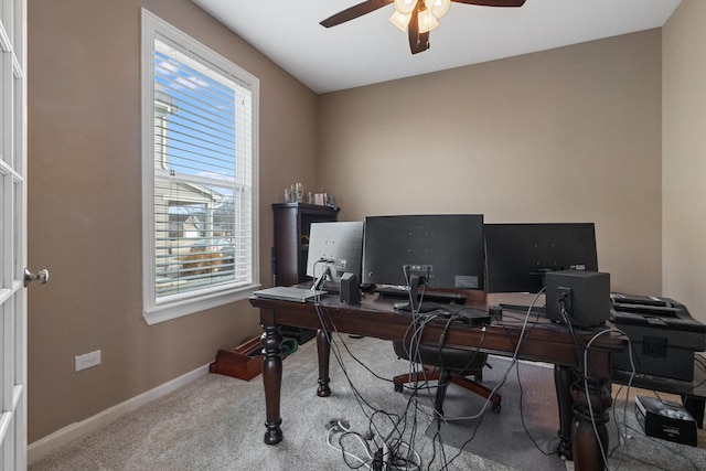 office space with ceiling fan and carpet flooring