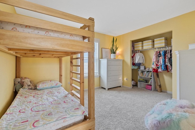 carpeted bedroom featuring a closet