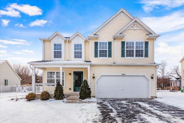 view of front of property with a garage