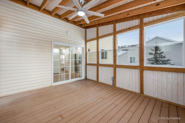 unfurnished sunroom with beam ceiling, wooden ceiling, and ceiling fan