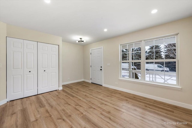 entrance foyer featuring light hardwood / wood-style flooring