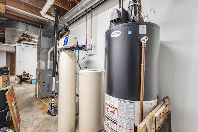 utility room with gas water heater and heating unit