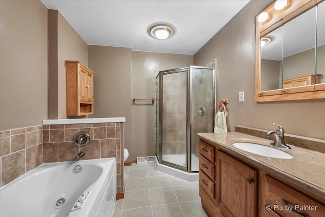 full bathroom featuring vanity, toilet, tile patterned flooring, and plus walk in shower