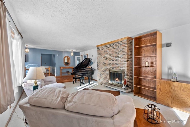 carpeted living room featuring a brick fireplace and a textured ceiling