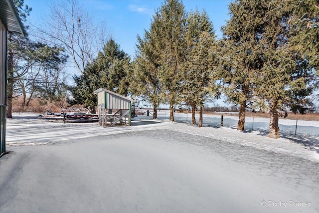 view of snowy yard