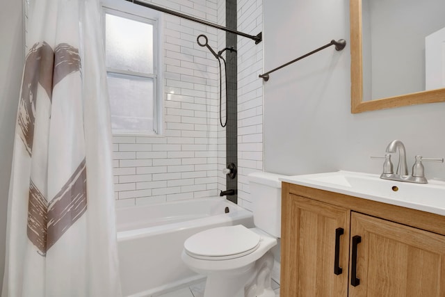 full bathroom with vanity, toilet, and shower / bath combo