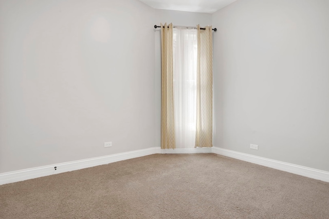 view of carpeted spare room