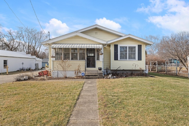 bungalow with a front lawn