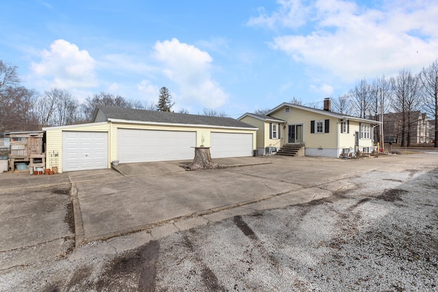 single story home with a garage