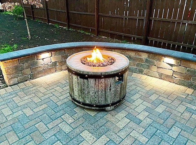 exterior space with an outdoor fire pit