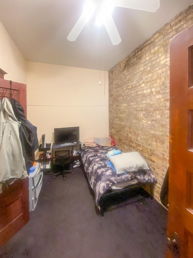 bedroom with ceiling fan and carpet