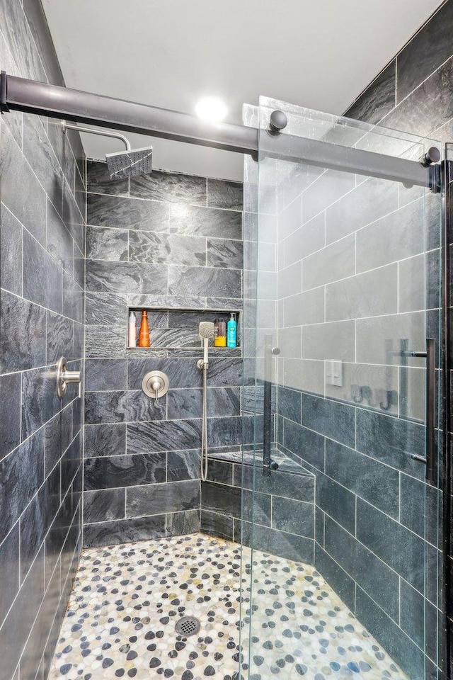 bathroom featuring walk in shower