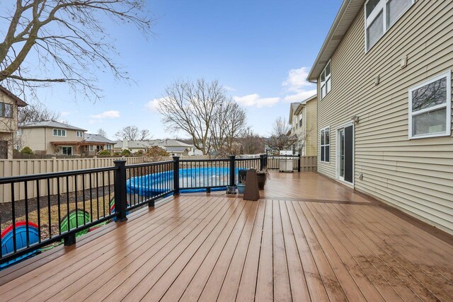 deck with a covered pool