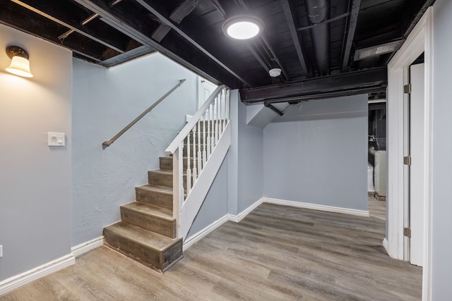 basement with wood-type flooring