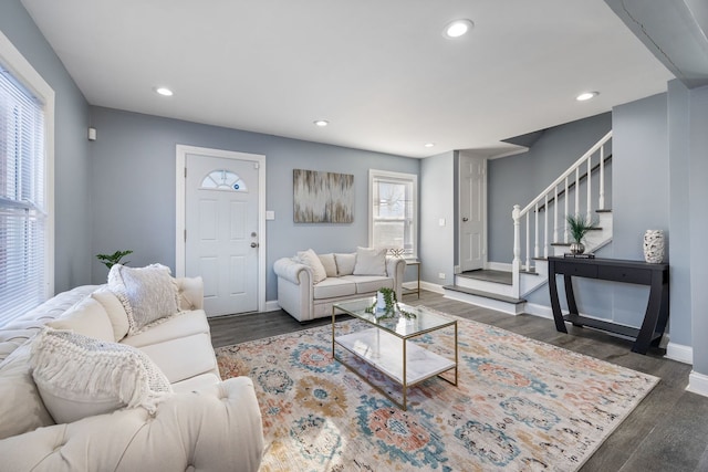 living room featuring dark wood-type flooring